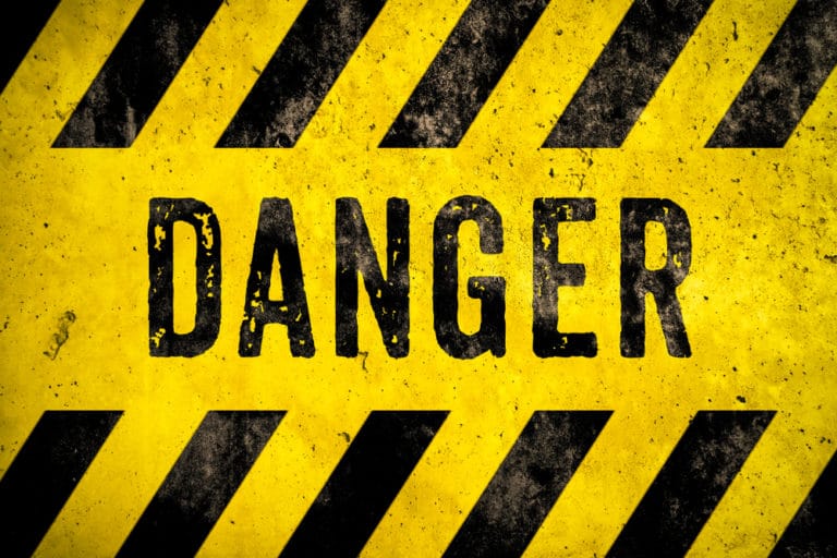 Yellow warning sign displaying DANGER in black, capital letters