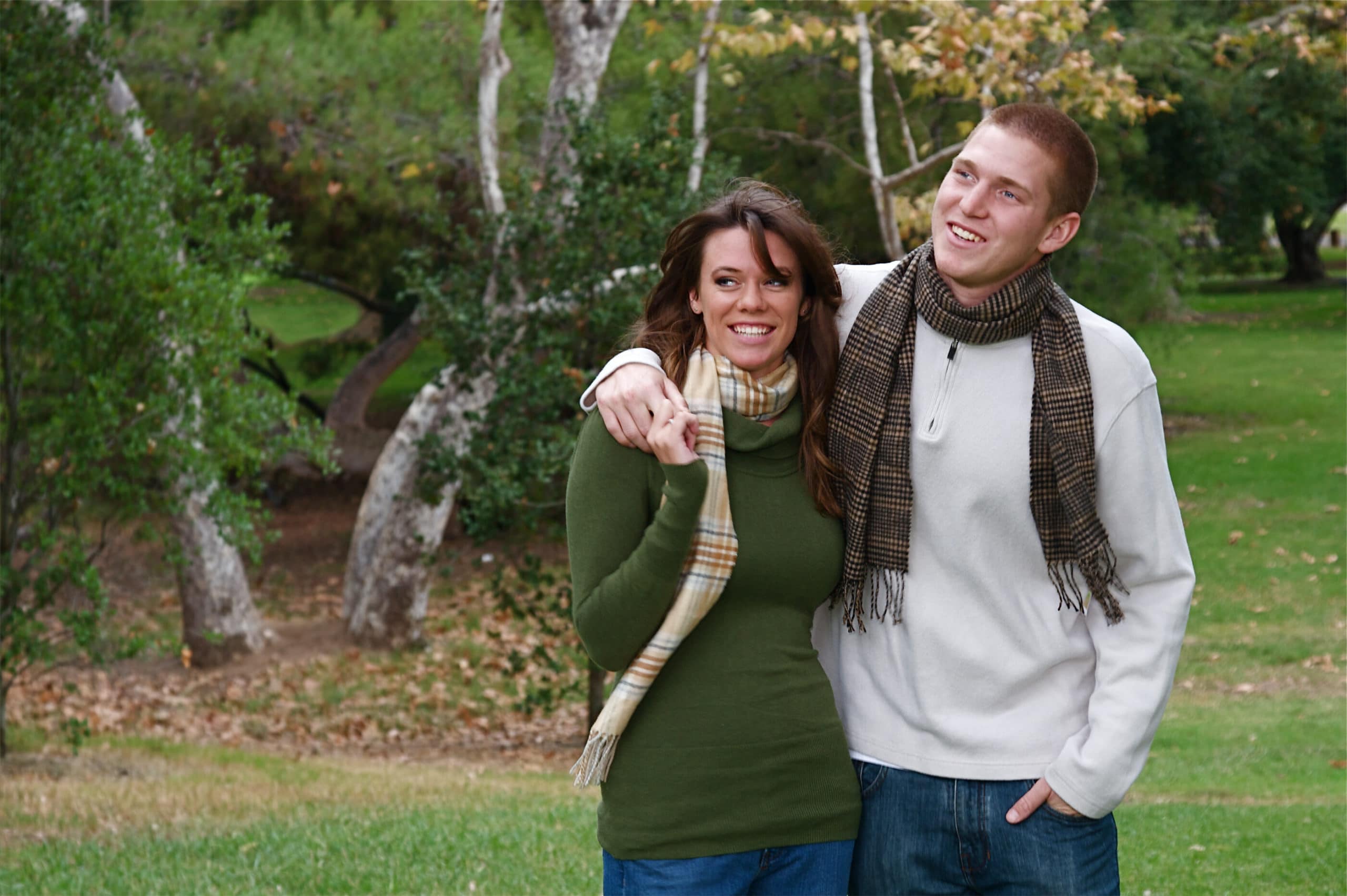 Married couple in a field in autumn