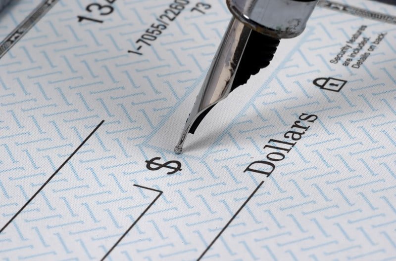 Blank check with fountain pen