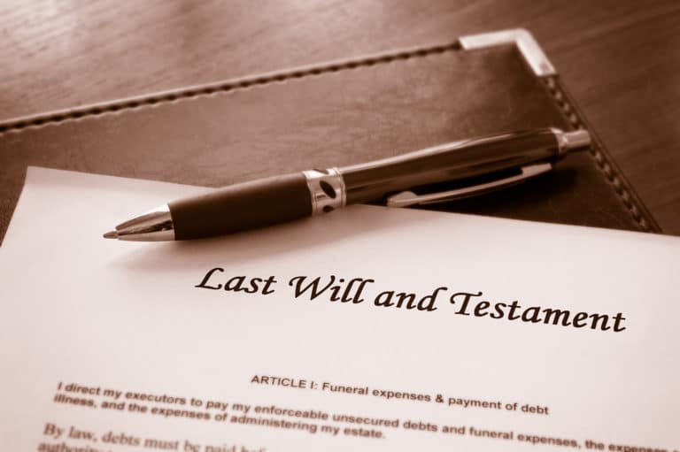 Last will and testament document with pen